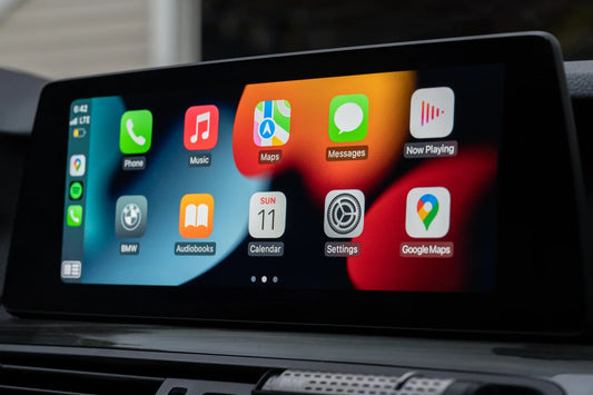 BMW F10 G30 display bracket showing a touchscreen interface with various app icons.