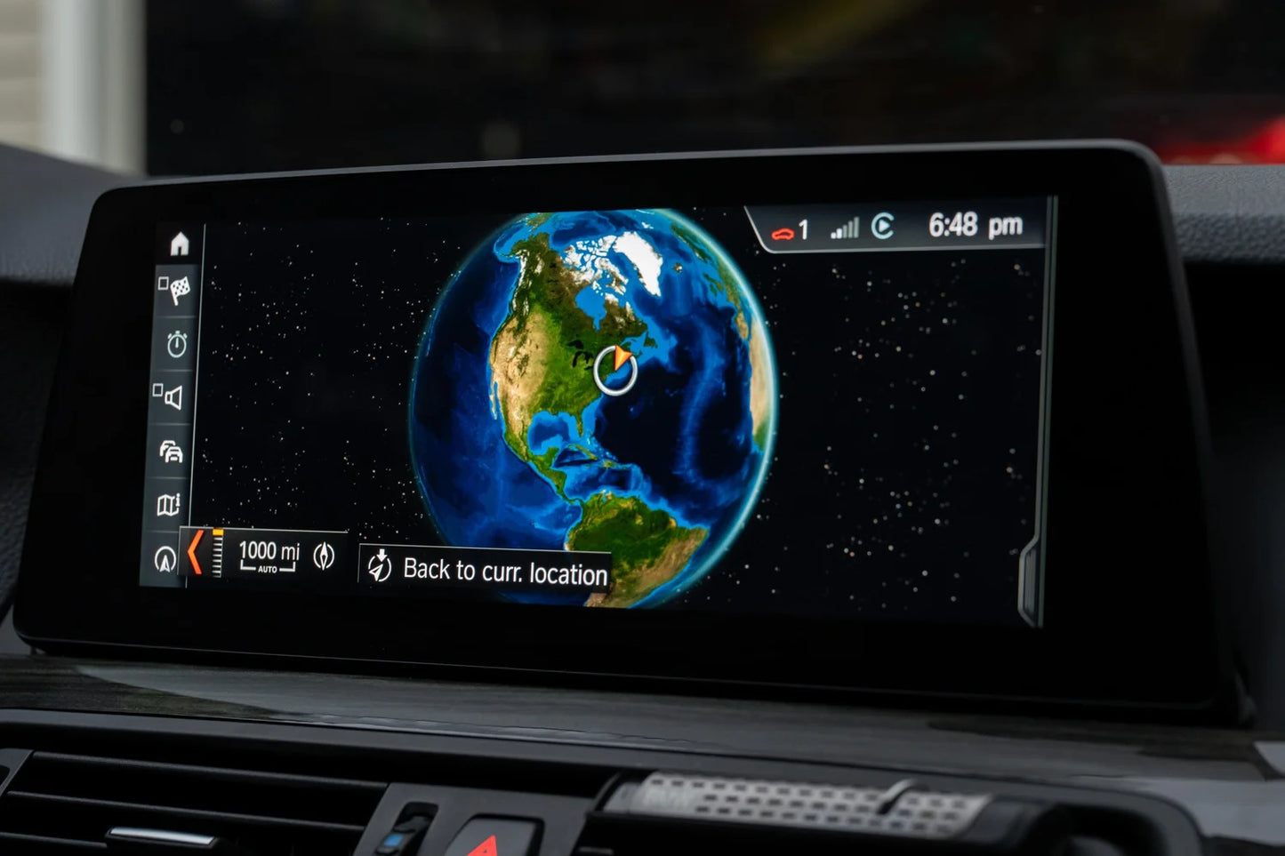 NBT EVO retrofit F series BMW displaying full-screen navigation map on ID6 operating system.